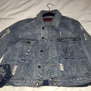 Jean jacket with mini rips